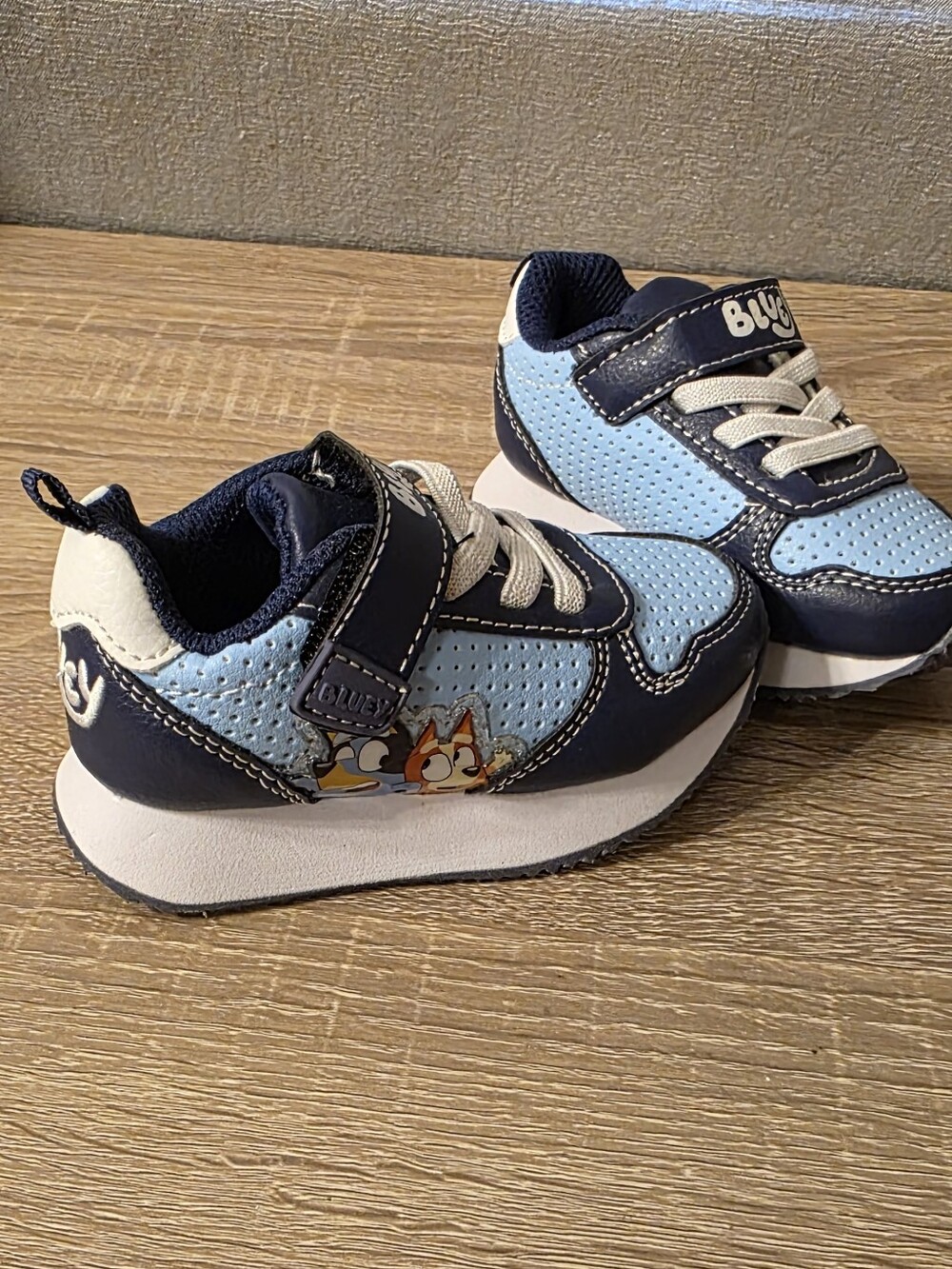Kids Light Blue & Navy Athletic Sneakers with Bluey On Them.